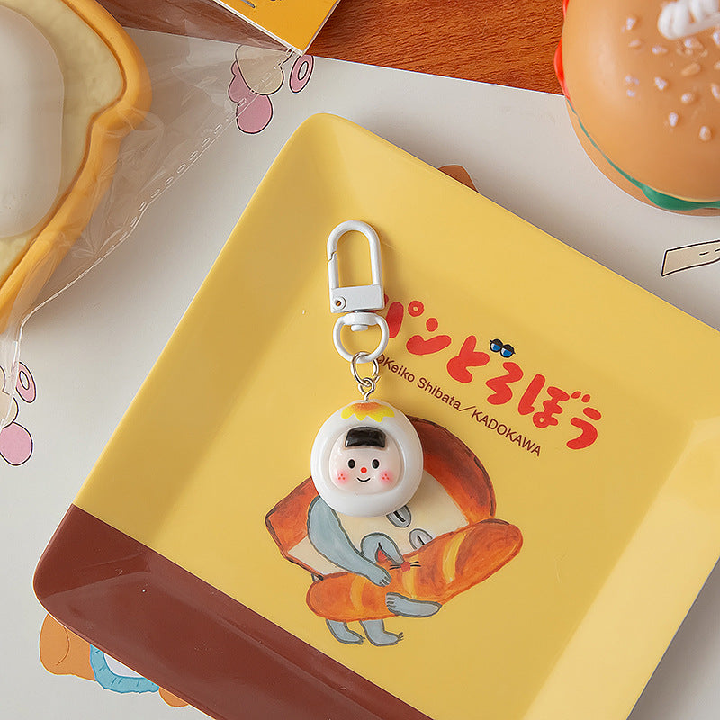 Couchette de dessin animé en gros porte-clés