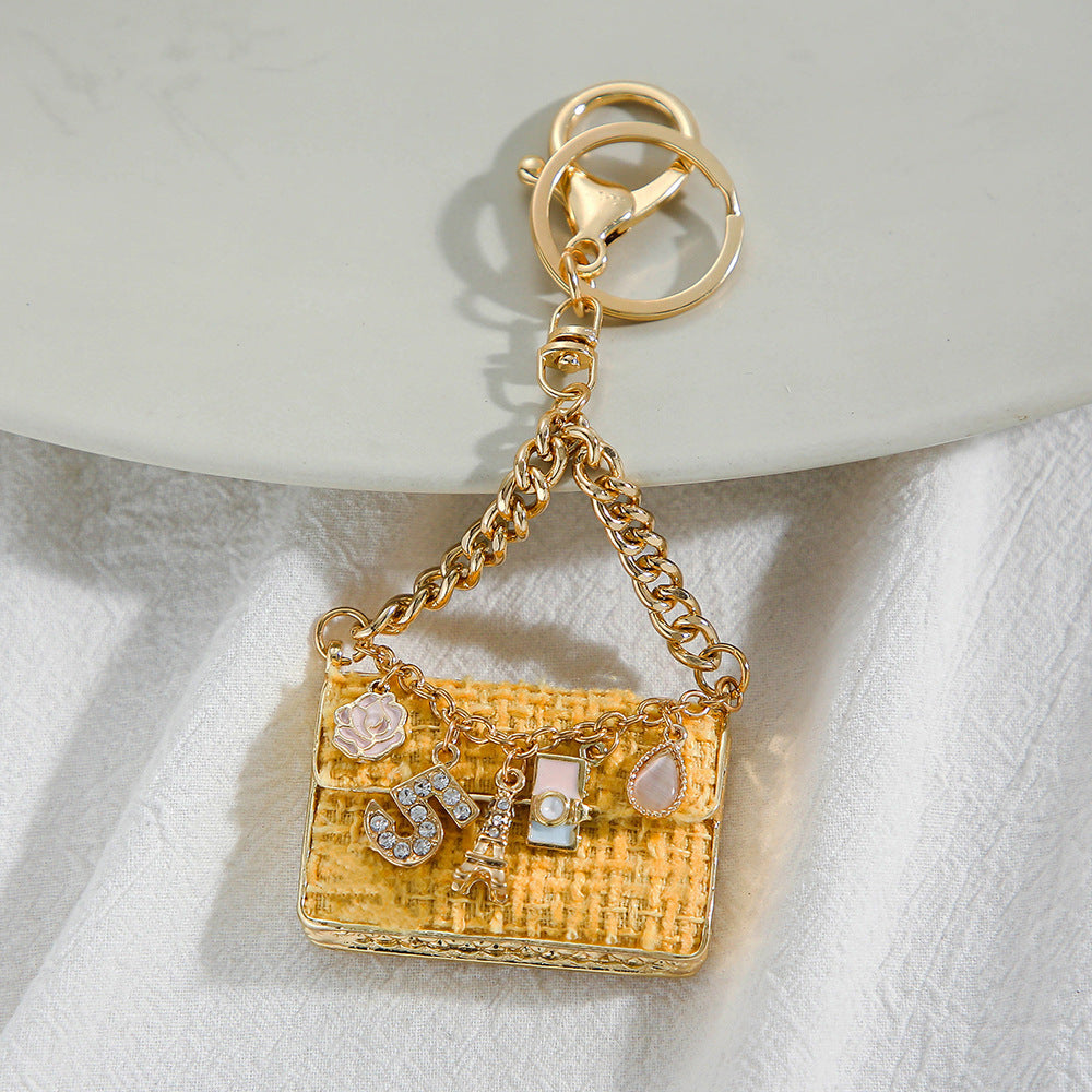 Wholesale Creative small gift bag key chain small pendant metal key chain