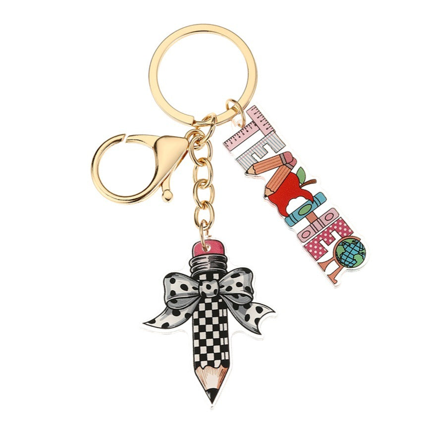 Wholesale acrylic bow pencil letter strip keychain pendant