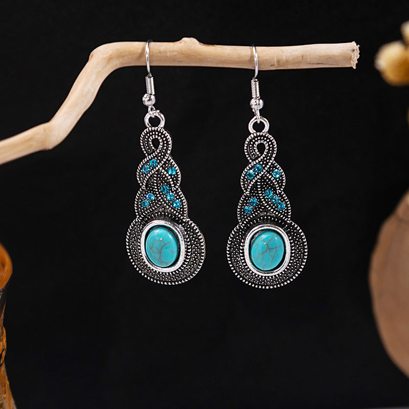 Wholesale retro ethnic style hollow flower tassel turquoise owl alloy earrings ACC-ES-MDD009
