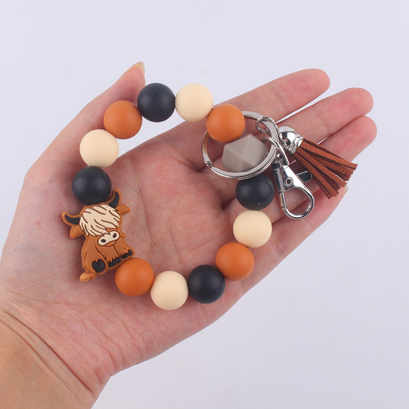 Wholesale Cartoon silicone cow keychain accessories creative handmade wristlet keychain