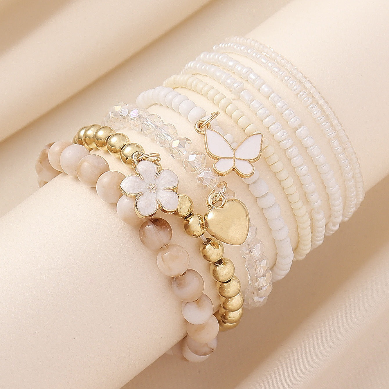 Wholesale Bohemian Flower Love Butterfly Pendant Bungee String Pearl Stacking Bracelet Set