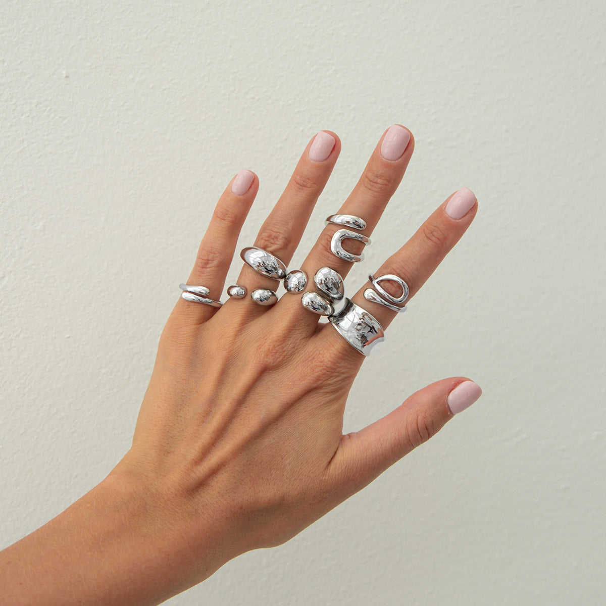 Wholesale Geometric three-dimensional cross-opening smooth alloy ring set