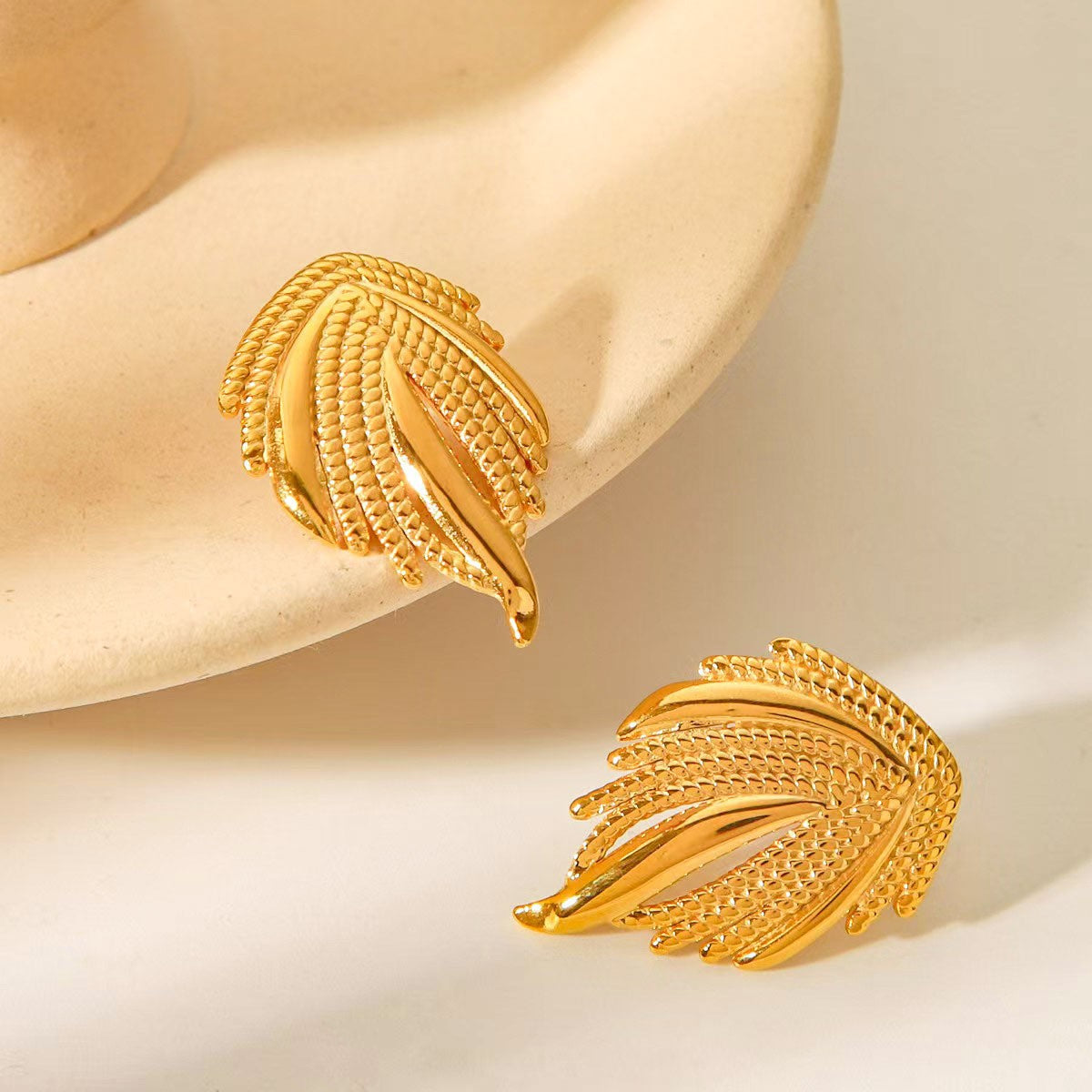 Wholesale Trendy Gold Tone Stainless Steel Statement Earrings Featuring Wing Ball Conch Design For Party Jewelry Accessory