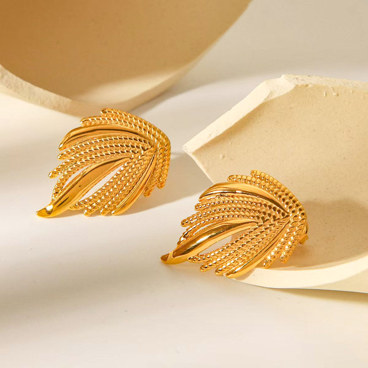 Wholesale Trendy Gold Tone Stainless Steel Statement Earrings Featuring Wing Ball Conch Design For Party Jewelry Accessory
