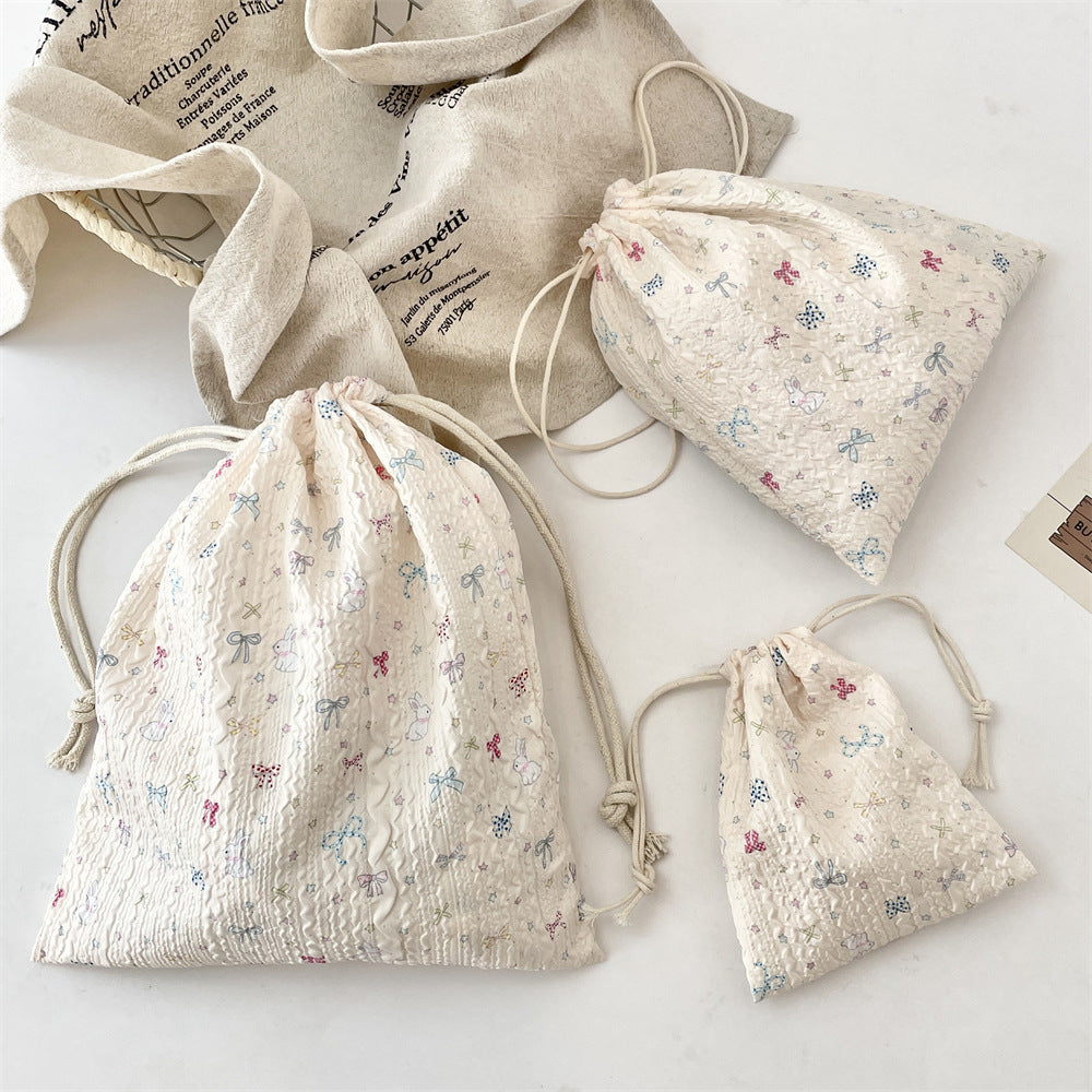 Wholesale Trendy Cartoon Embossed Drawstring Makeup Pouch Small Polyester Cosmetic Storage Bag Dustproof Portable Organizer Fashion Accessory