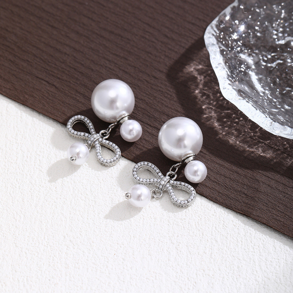 Wholesale Pearl bow pendant stud earrings