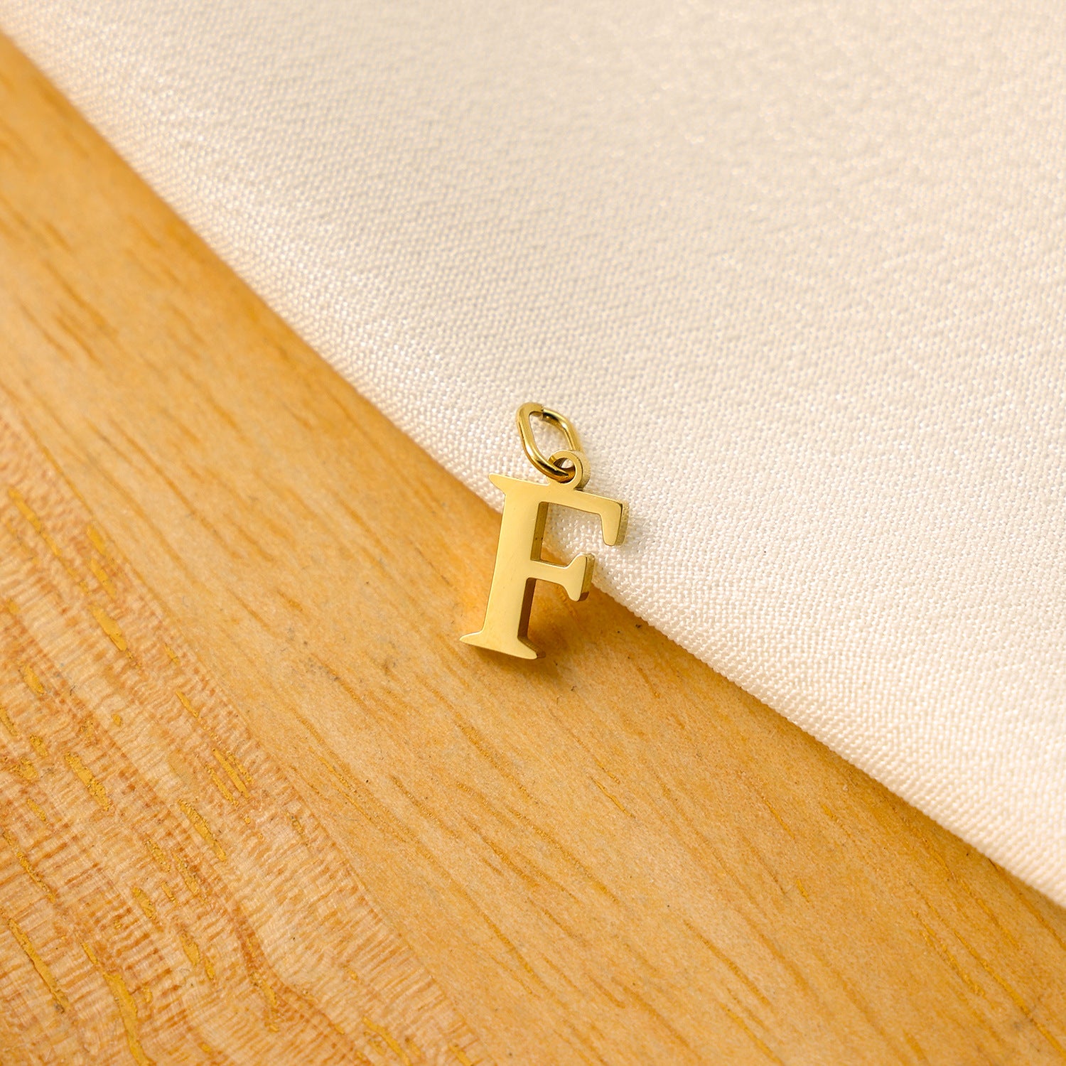 Wholesale Titanium steel letter pendant