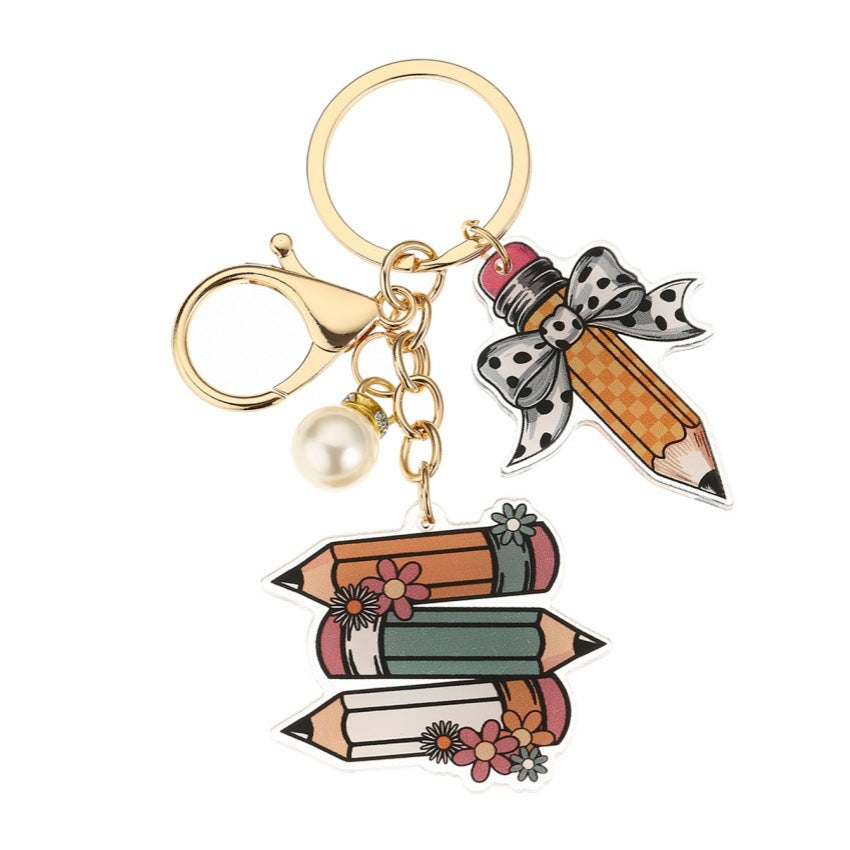 Portachiavi a matita con slogan e lettera di perle di libro acrilico all'ingrosso