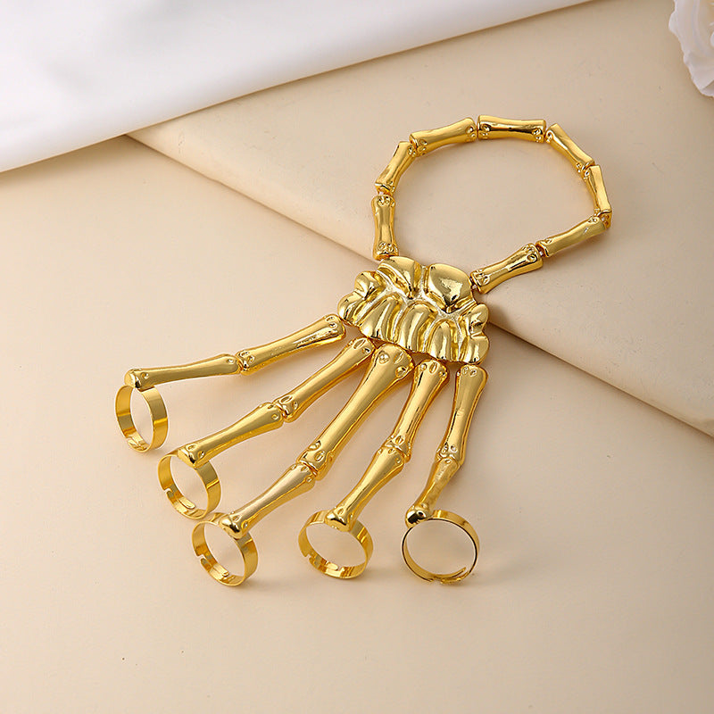Wholesale punk style five finger ring exaggerated skull bracelet