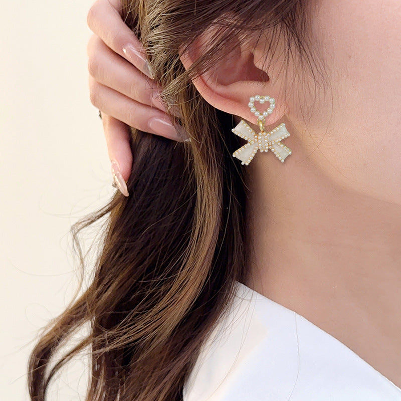 Wholesale Pearl Tassel Bow S925 Silver Needle Alloy Earrings ACC-ES-RuLong006