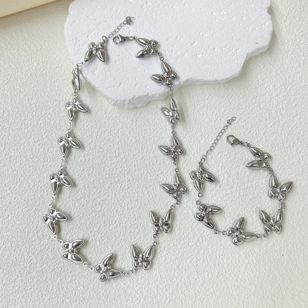 Wholesale  stainless steel three-dimensional hollow butterfly bracelet necklace suit
