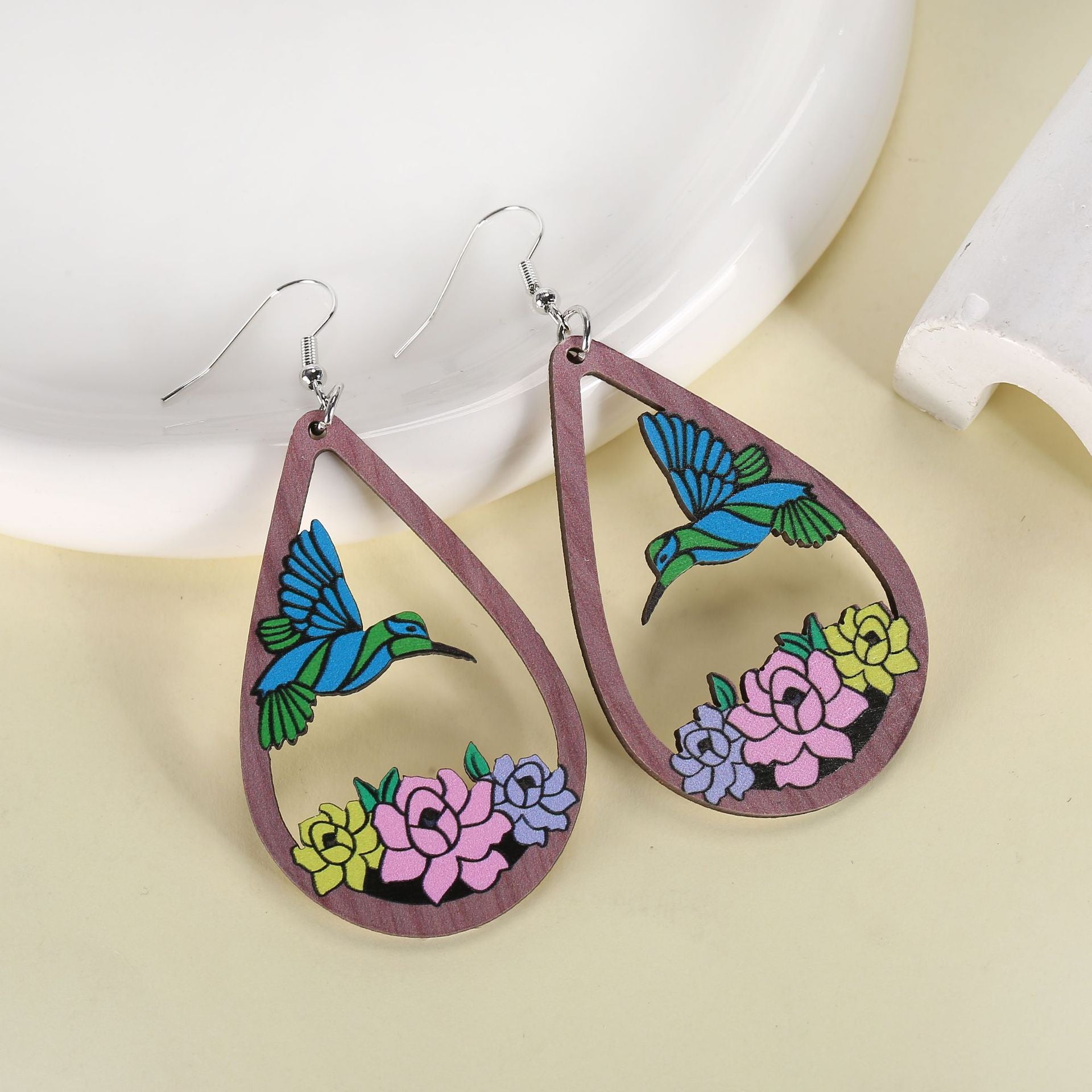 Wholesale hollow water drop bird flower earrings