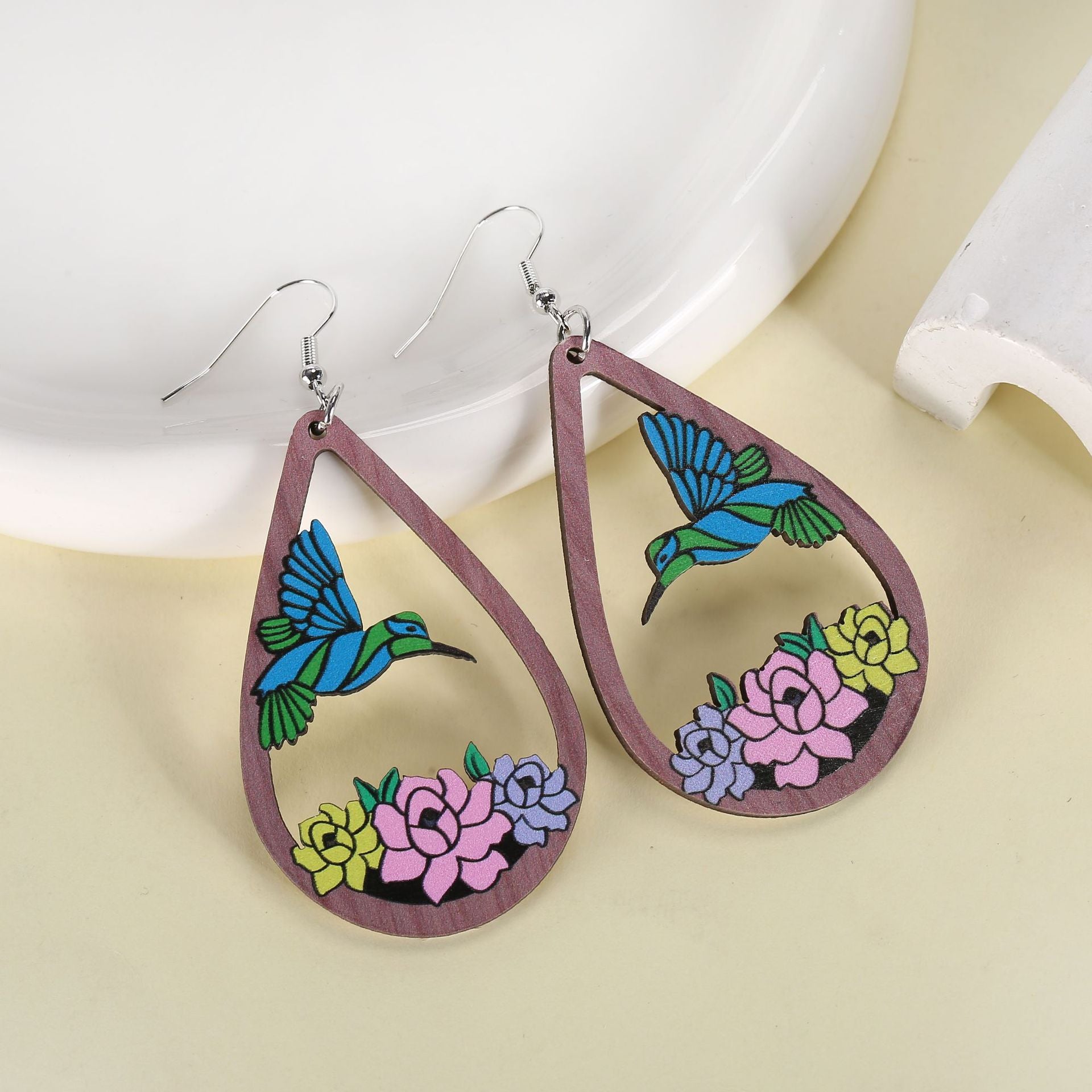 Wholesale hollow water drop bird flower earrings