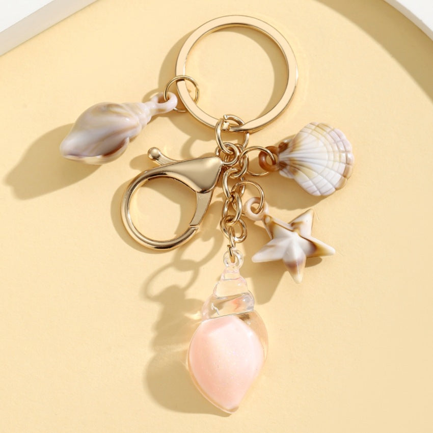Wholesale Luminous Resin Starfish Crystal Conch Keychain Pendant for Women Car Bag Decoration - Boutique Resale