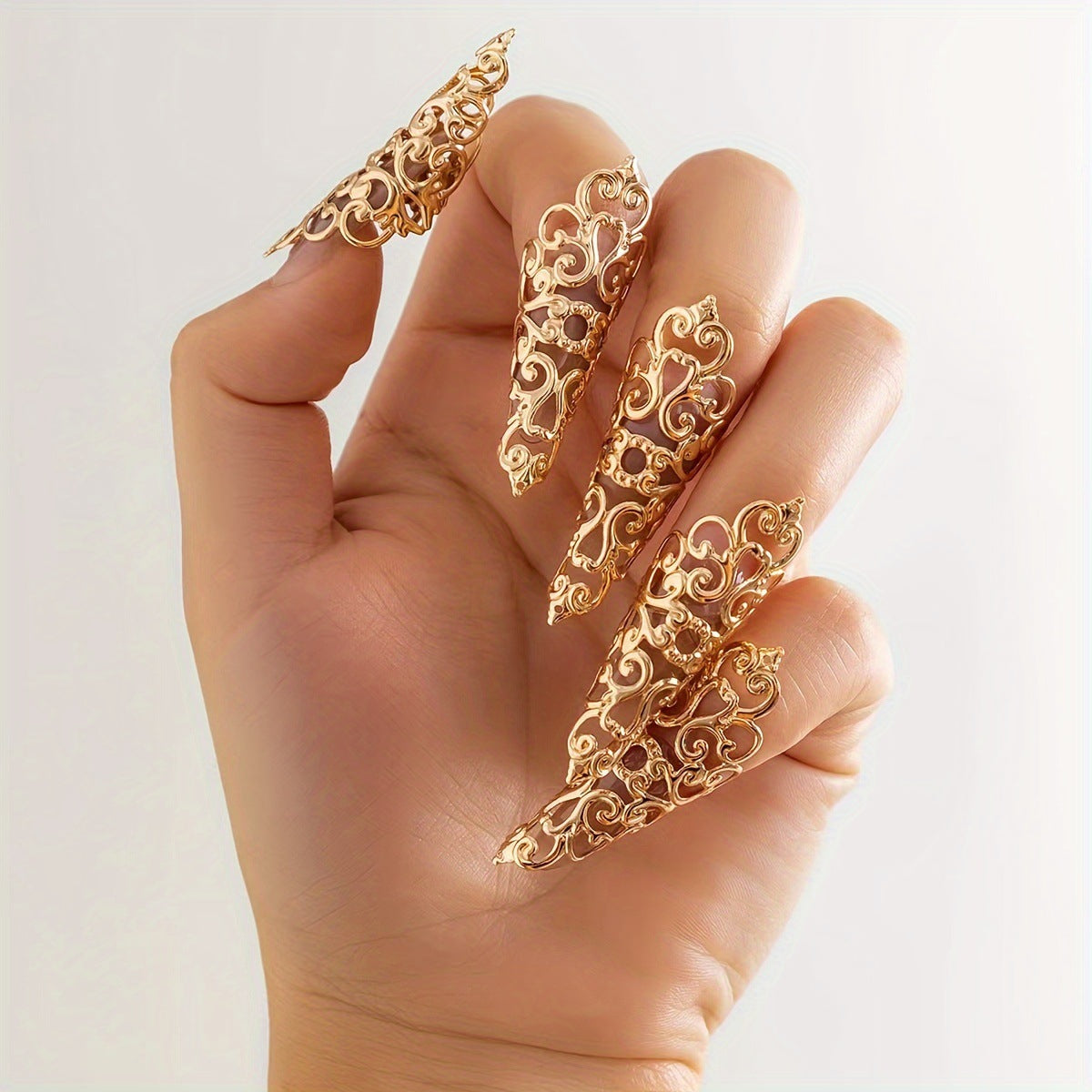 Wholesale Jewelry Hollow Pattern Cone-Shaped Nail Ring Set Metal Rings Dopamine Earrings for Women