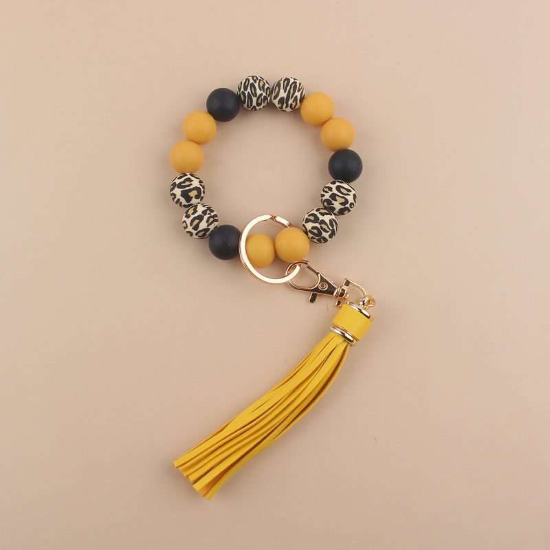 Wholesale  leopard silicone hand beaded bracelet handmade tassel bracelet keychain