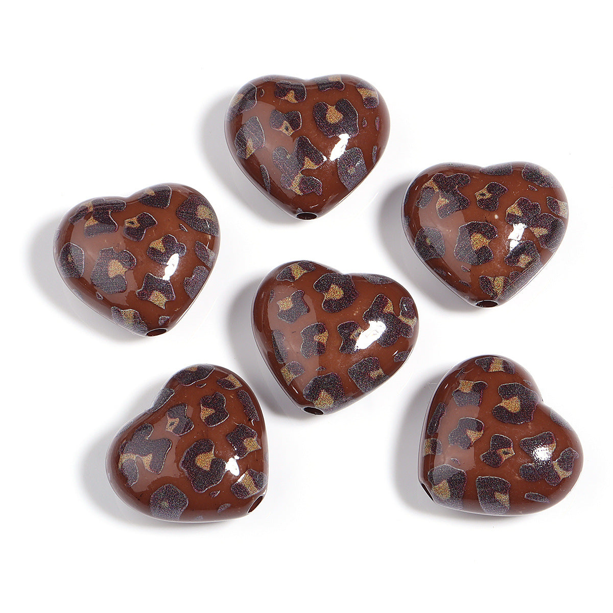Wholesale 5pcs Acrylic Beads of colorful leopard print heart-shaped acrylic beads for DIY crafts.