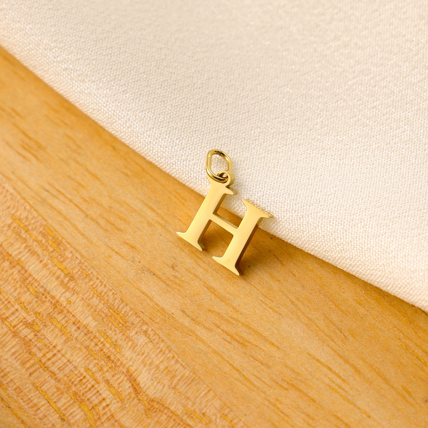 Wholesale Titanium steel letter pendant