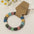 Wholesale volcanic stone beaded kraft paper elastic  bracelet