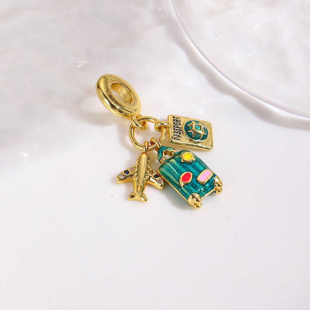 Wholesale Copper oil drop grape cola suitcase camera earphone three-piece pendant set