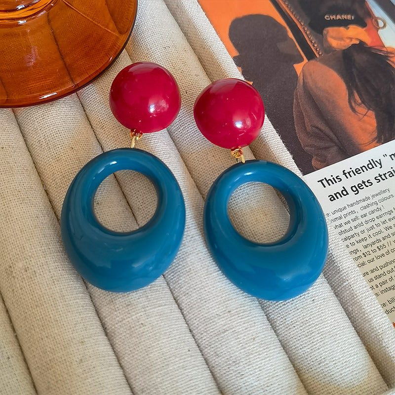 Wholesale exaggerated blue and red ear clips