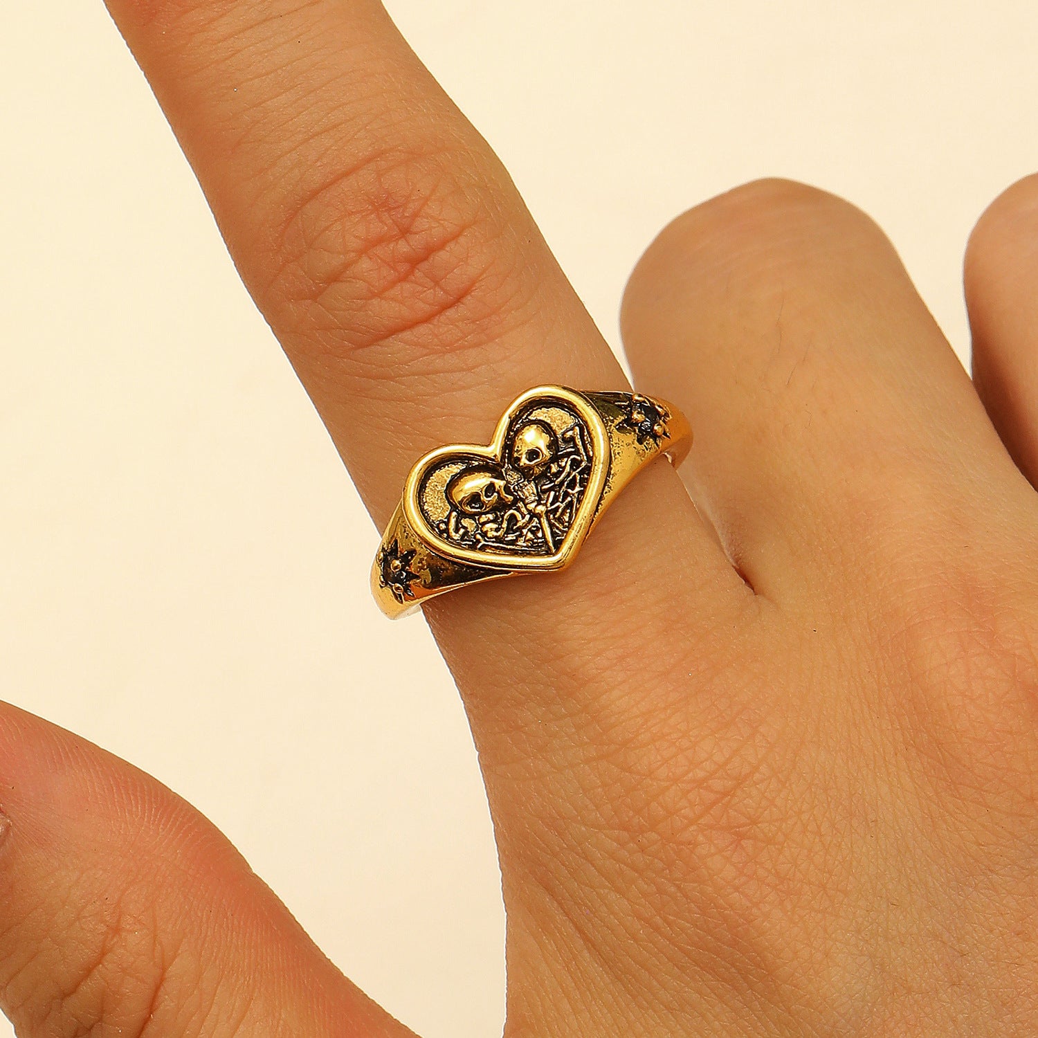 Wholesale heart double skull starburst open ring