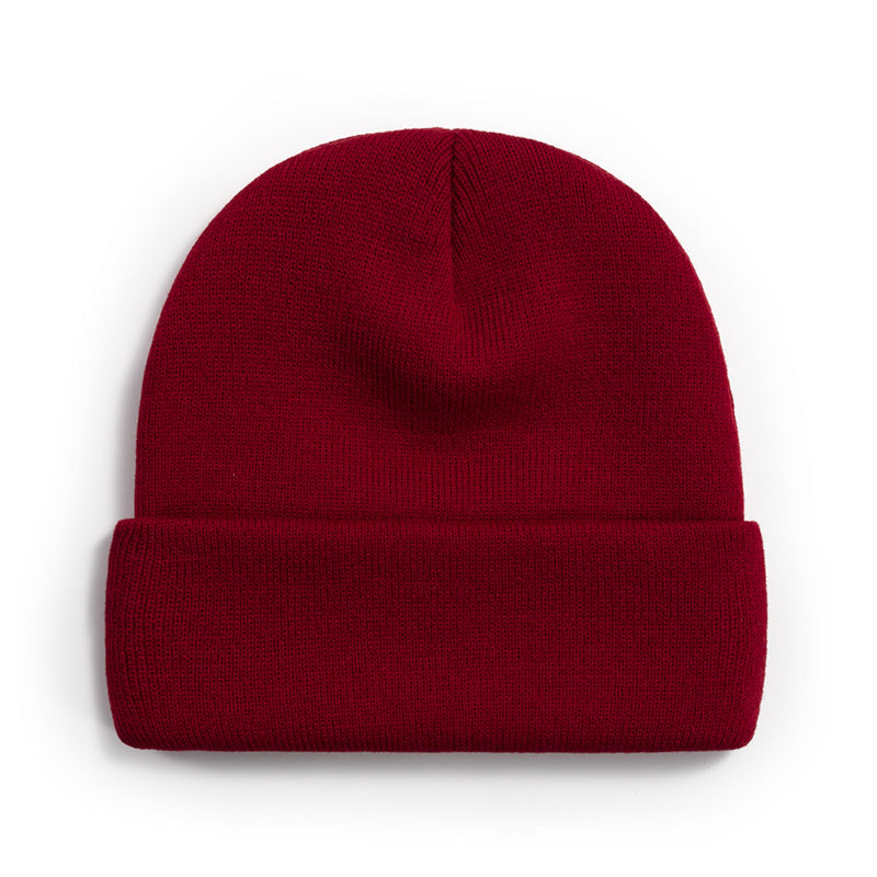 Wholesale light plate knitted cold cap acrylic solid color wool cap