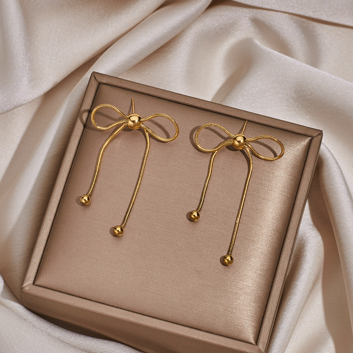 Wholesale Stainless Steel Earrings Tassel Snake Bone Chain Bow Earrings ACC-ES-Hongx001