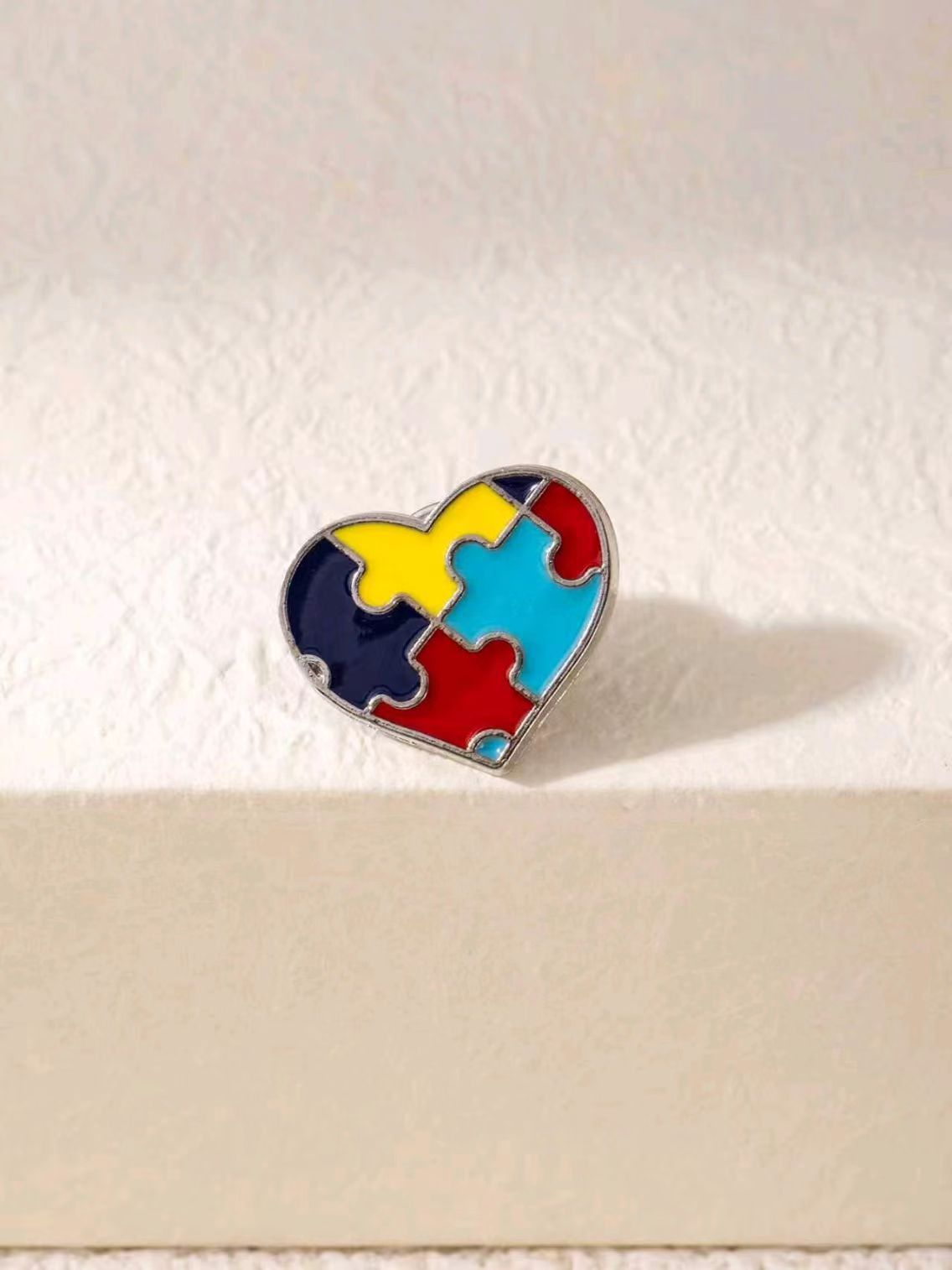 Wholesale Color-block puzzle brooch to support autism