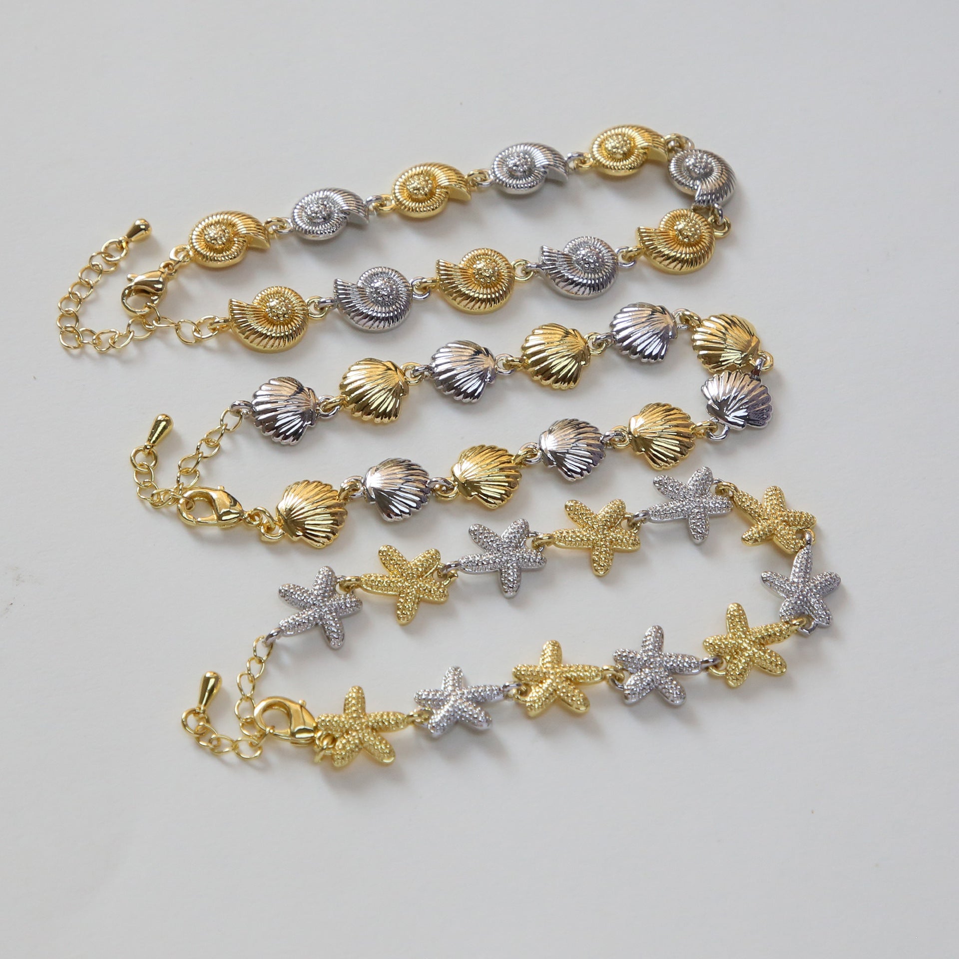 Wholesale Brass two-tone electroplated beach conch starfish shell bracelet