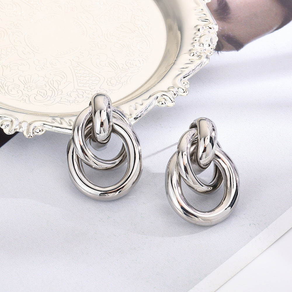 Wholesale geometric exaggerated smooth hollow tube winding earrings