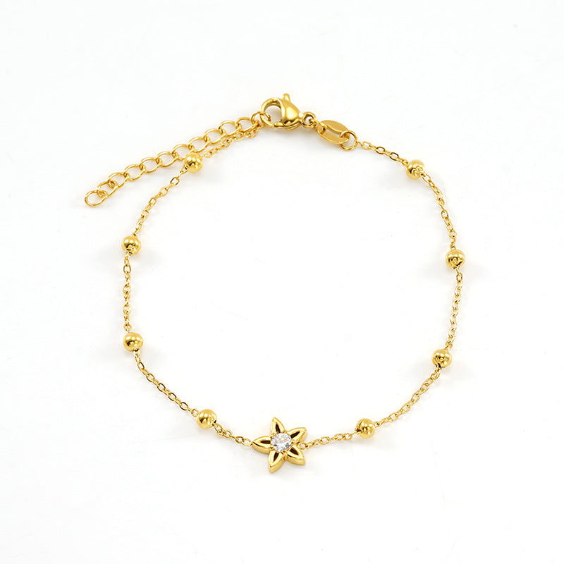 Wholesale Stainless steel bracelet with zircon flowers and a bowknot design