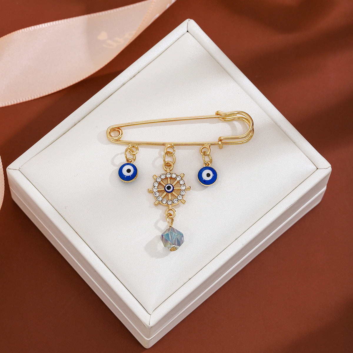 Wholesale Diamond-encrusted Devil' s Eye Tassel Brooch