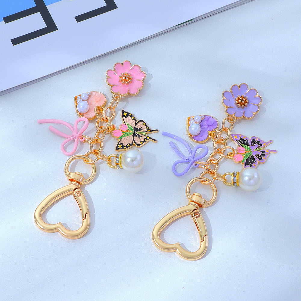 Wholesale Enamel Butterfly Flower Keychain with Pearl Pendant - Trendy Car Key Accessory