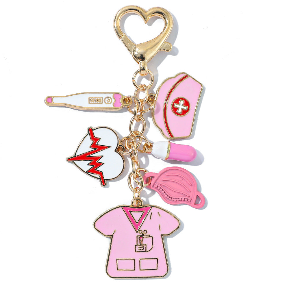 Wholesale Classic nurse cap thermometer pill mask heartbeat nurse suit zinc alloy keychain