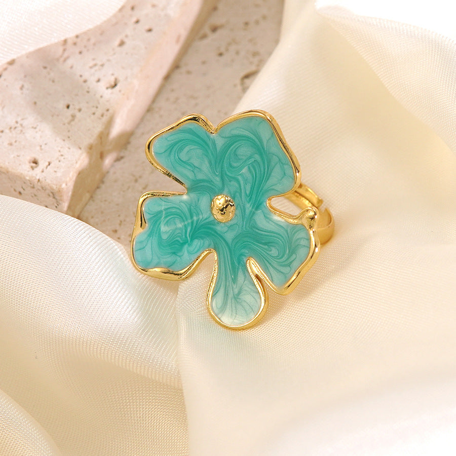 Anello all'ingrosso del fiore dell'acciaio inossidabile di stile di festa dell'anello del fiore della goccia dell'olio