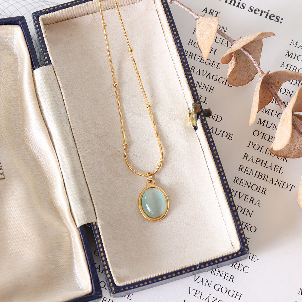 Wholesale French Retro Titanium Steel 18K Gold Plated Cat Eye Oval Pendant Necklace Women S Collarbone Chain Fashion Accessory