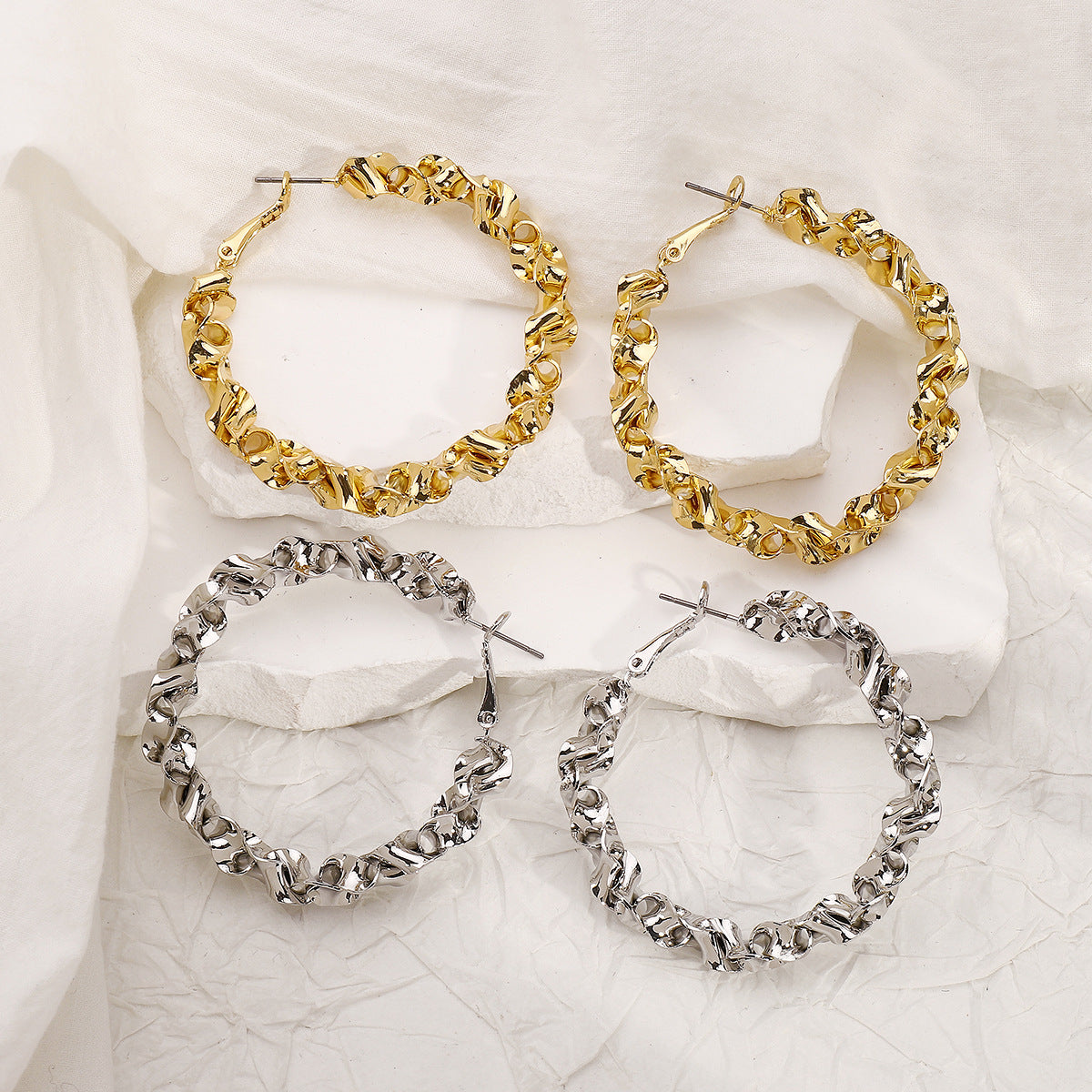 Wholesale geometric irregular twist metal style earrings