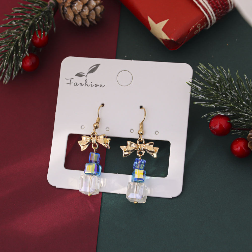 Orecchini in cristallo con stella e fiocco all'ingrosso