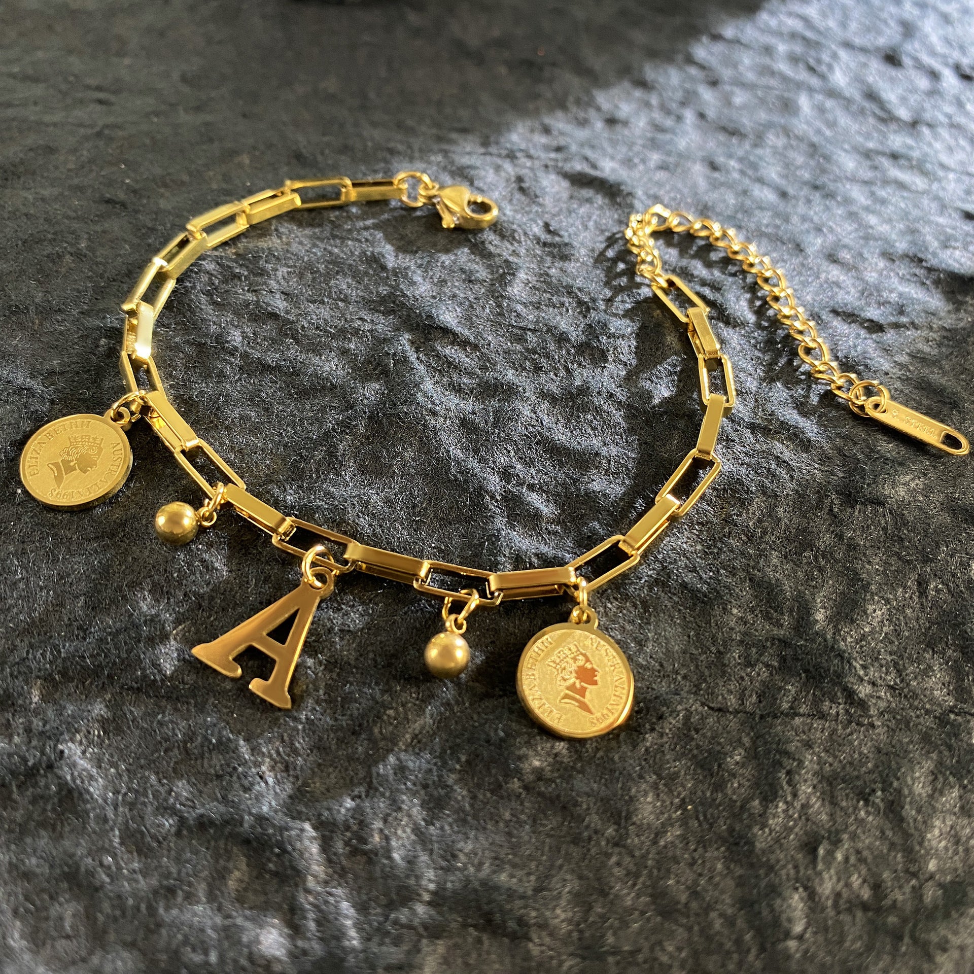 Wholesale Titanium Steel 18K Gold Plated Queen's Head Letter Bracelet ACC-BT-YuXun007