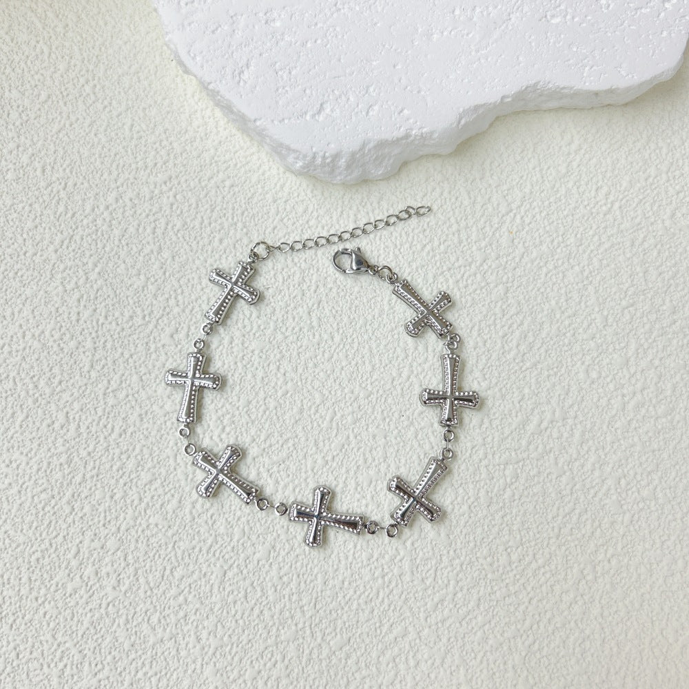 Wholesale  light luxury stainless steel three-dimensional hollow cross bracelet necklace suit