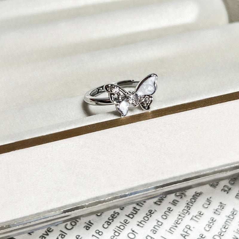 Wholesale White Drop Glaze Butterfly Saturn Fashion Ring