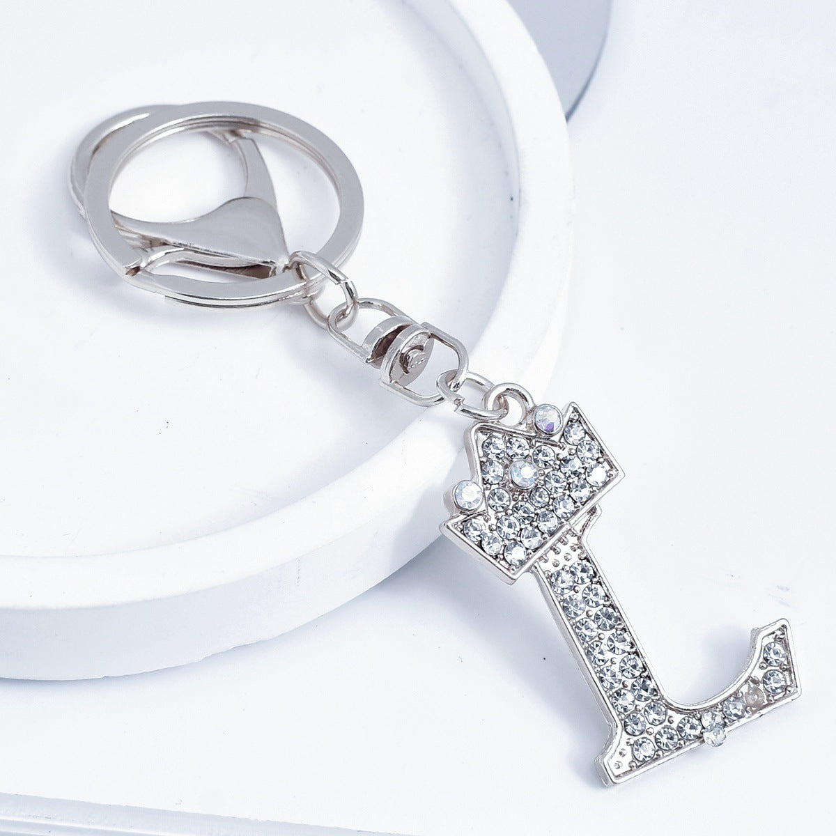 Wholesale Stylish Rhinestone 26 Letter Keychain Zinc Alloy Silver Metal Pendant Car Backpack Accessory Fashion Jewelry Gift For Resale
