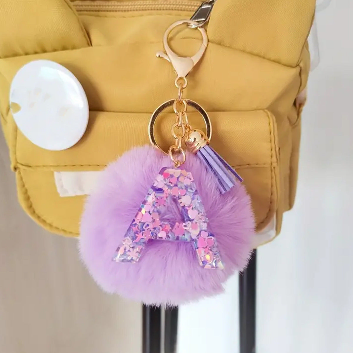 Wholesale Cute resin pom-pom 26 letter keychain