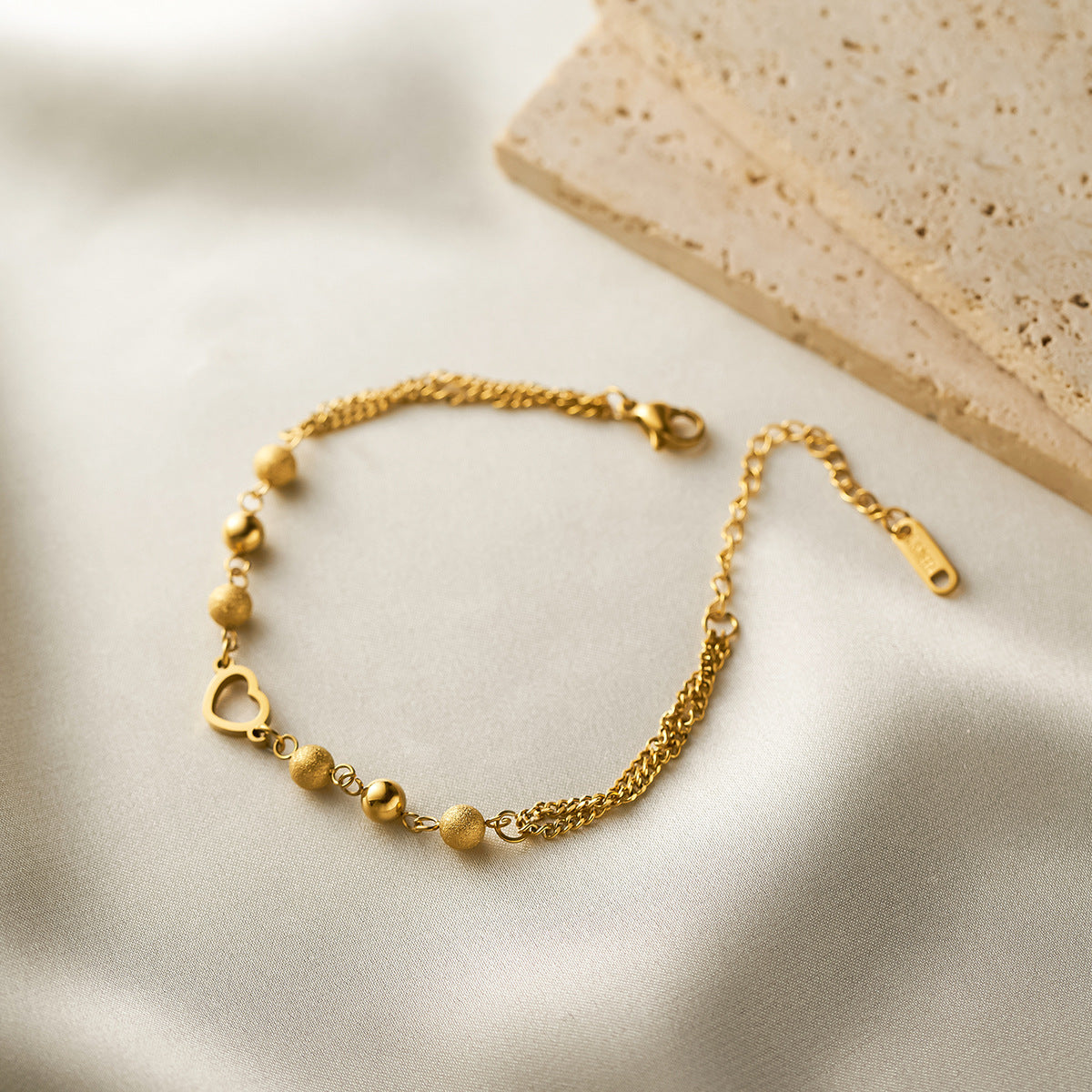 Wholesale Women's hollow heart titanium steel bracelet