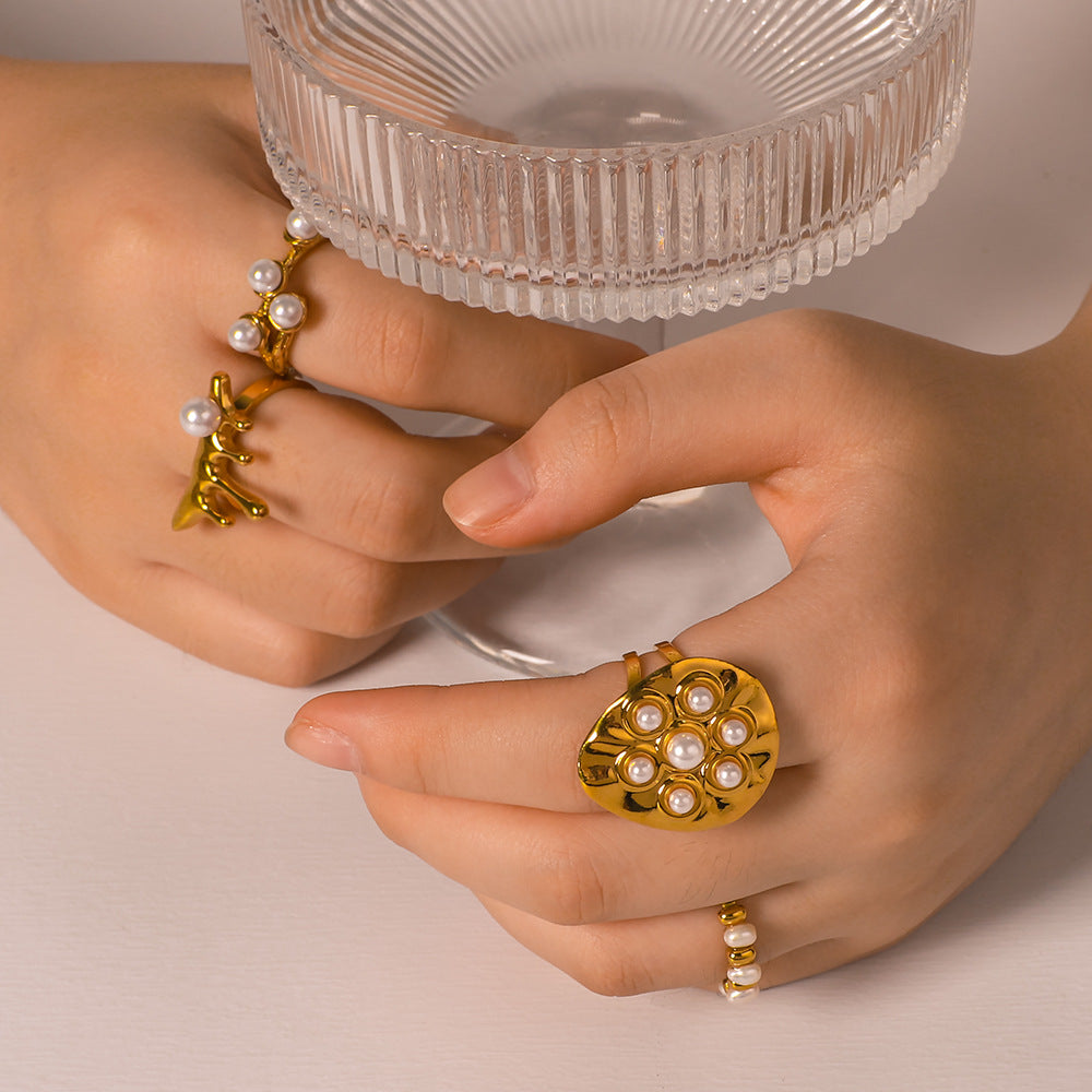Wholesale romantic pearl asymmetric shaped water drop oval 18K gold titanium steel rings