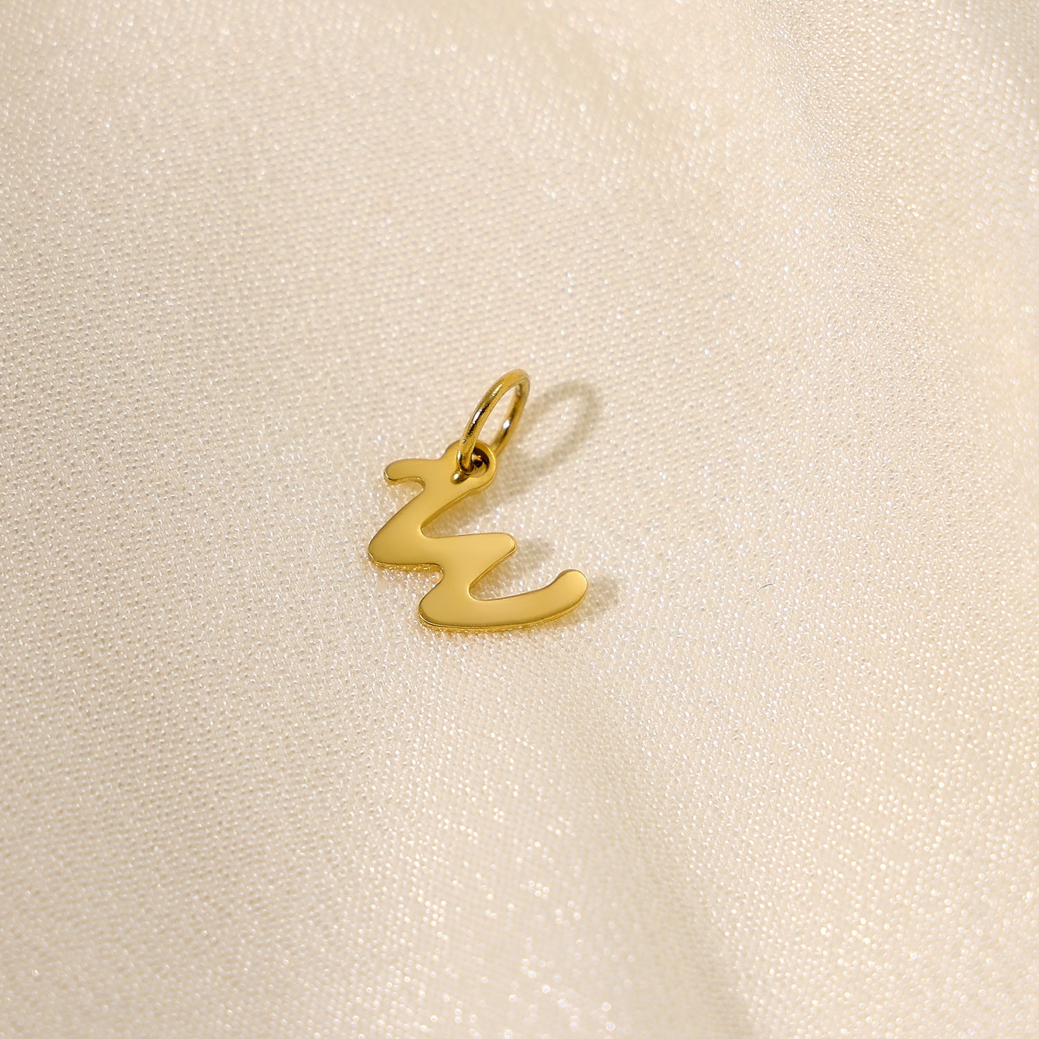 Wholesale 26 English letters stainless steel letter pendant