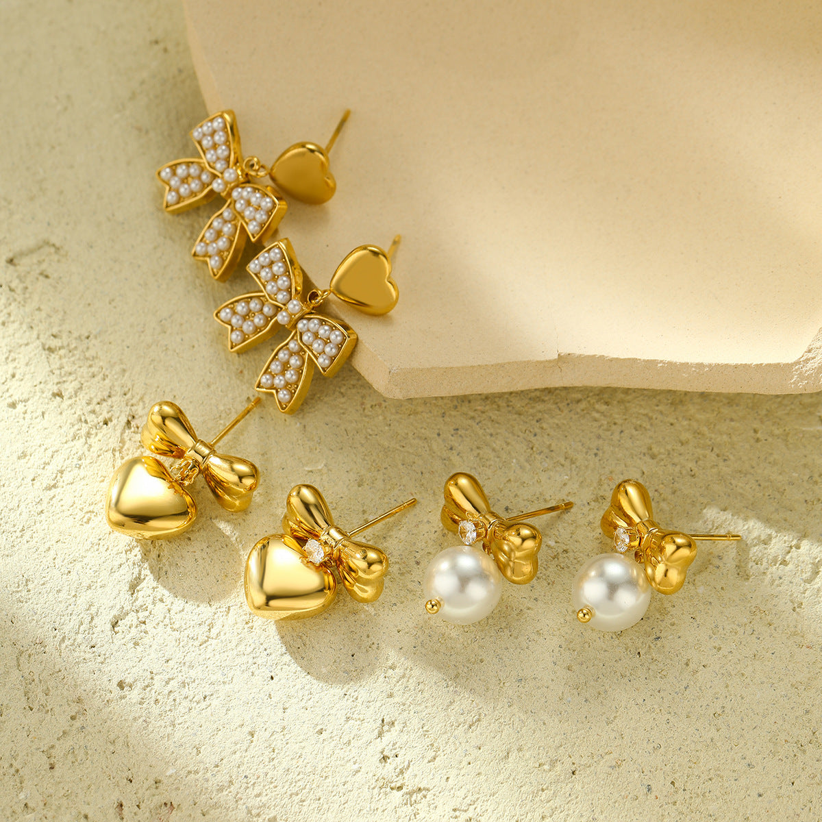 Wholesale  zircon bow  love stainless steel earrings