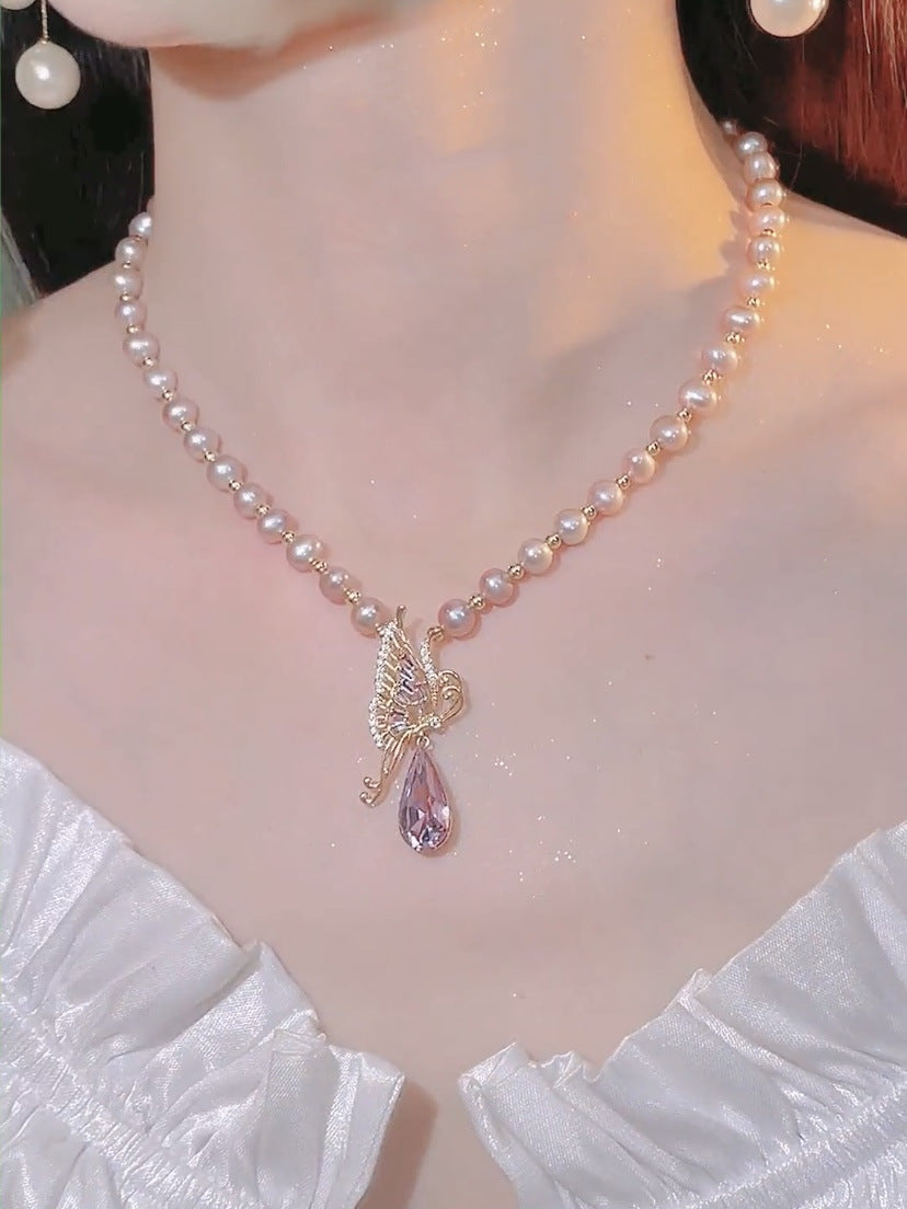 Wholesale Light luxury butterfly pearl sweater necklace
